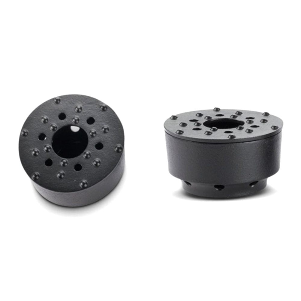 Czarna żeliwna podstawa czajnika.